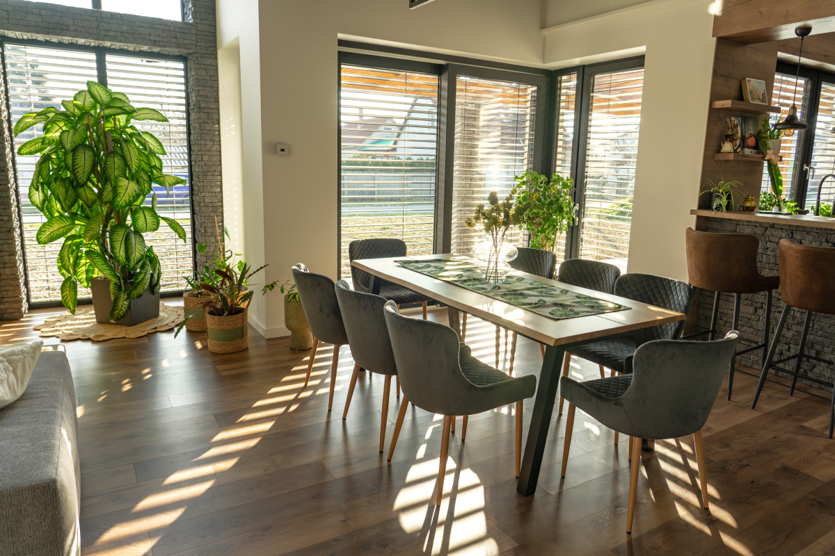 A modern dining space with large windows
